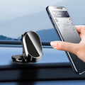 Magnetic car phone holder mounted on dashboard