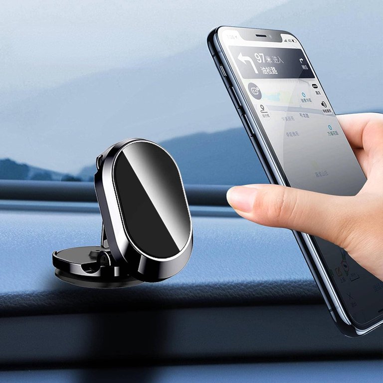 Magnetic car phone holder mounted on dashboard